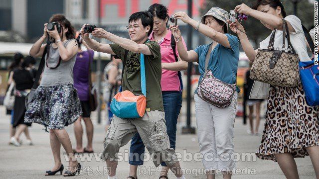 130517141050-china-tourists-hong-kong-camera-story-top.jpg