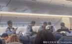 网传中国妇大闹机舱遭日警上机带走狂叫：你们要干什么