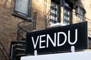 地产经纪人保证售出的广告系非法“担保”